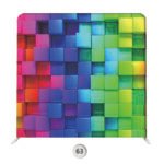 Colorful neon cube photo booth backdrop with bright geometric blocks in blue, green, red, purple, and pink.