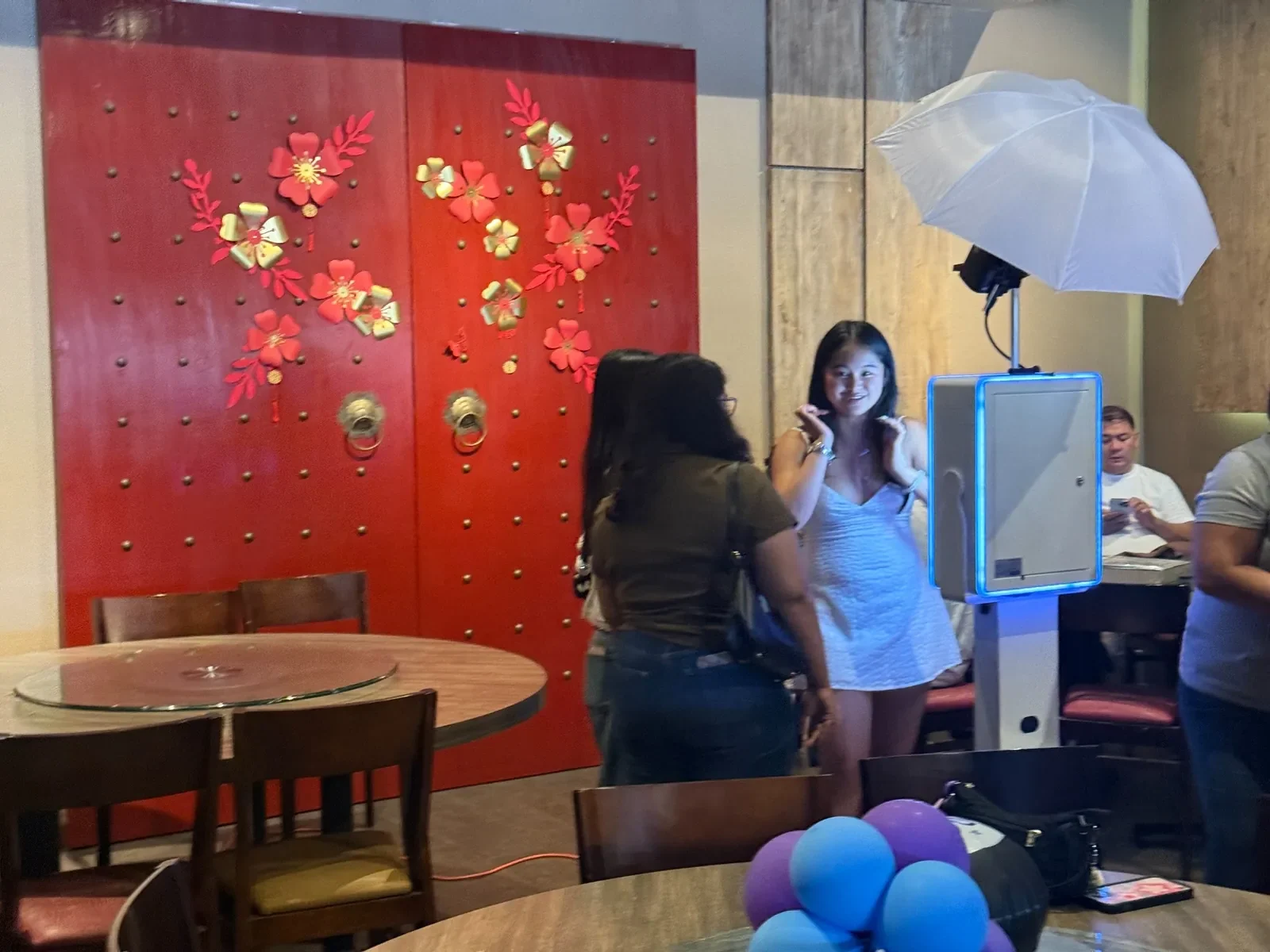 TurnKey-Pro photo booth capturing guests at an indoor Orange County event by beÜtiful Pixels