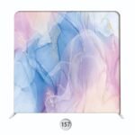 Pastel abstract photo booth backdrop with flowing blue, pink, and lavender tones accented with soft gold detailing.